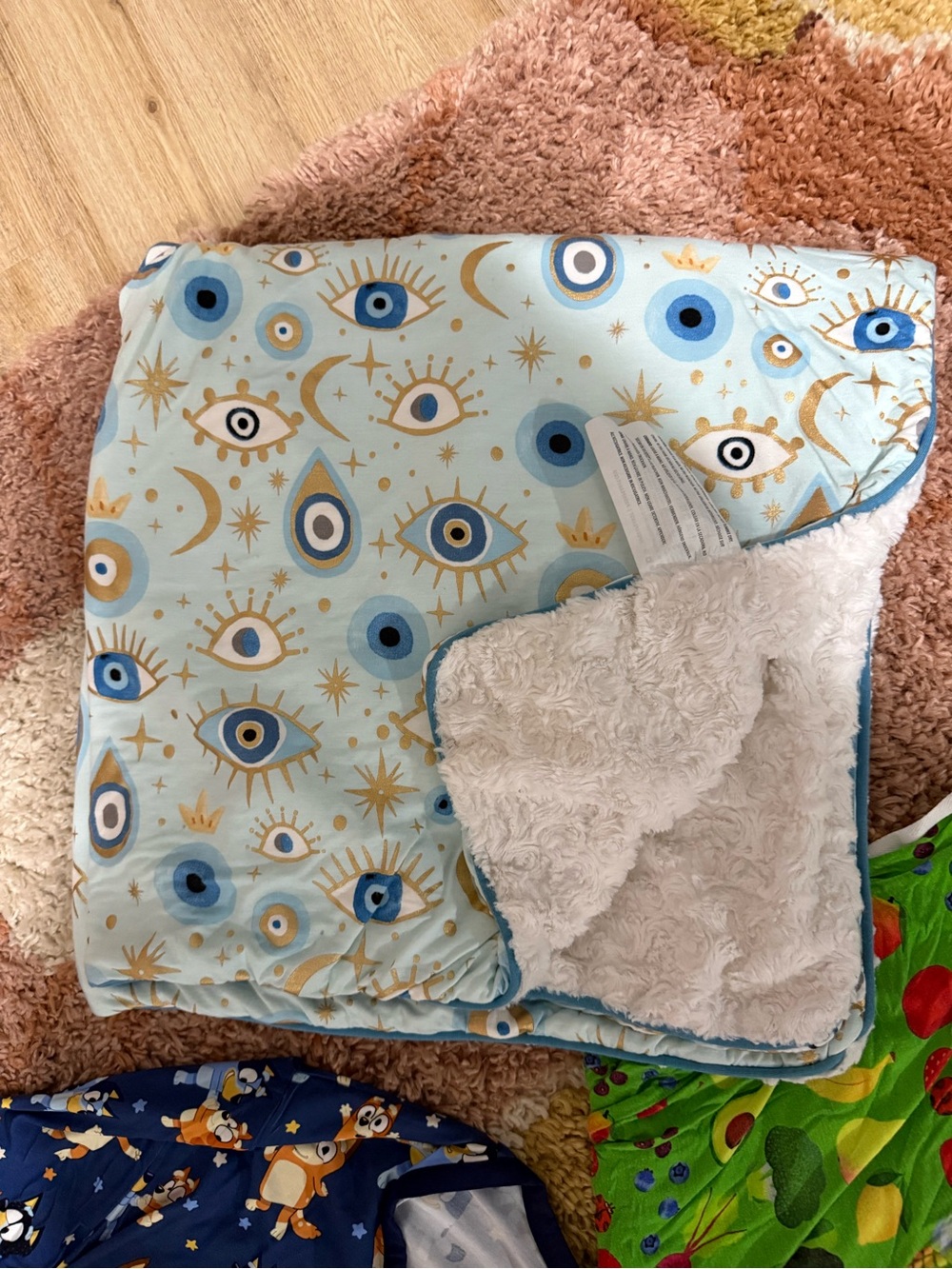 Posh peanut evil eye bamboo blanket